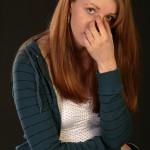 BodyLanguageProjectCom - Pinching The Bridge Of Nose